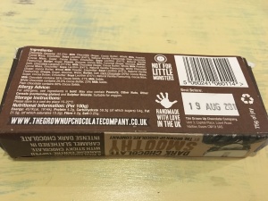 The Grown Up Chocolate Company Dark Chocolate Smoothy. Made in the UK. Rear of box view saying “Handmade with love in the UK”.
